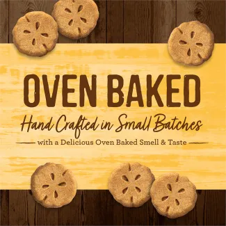 Oven Baked Grammy’s Pot Pie circular dog treats with a yellow background that says “Oven baked hand crafted in small batches with a delicious oven baked smell &amp; taste.” 